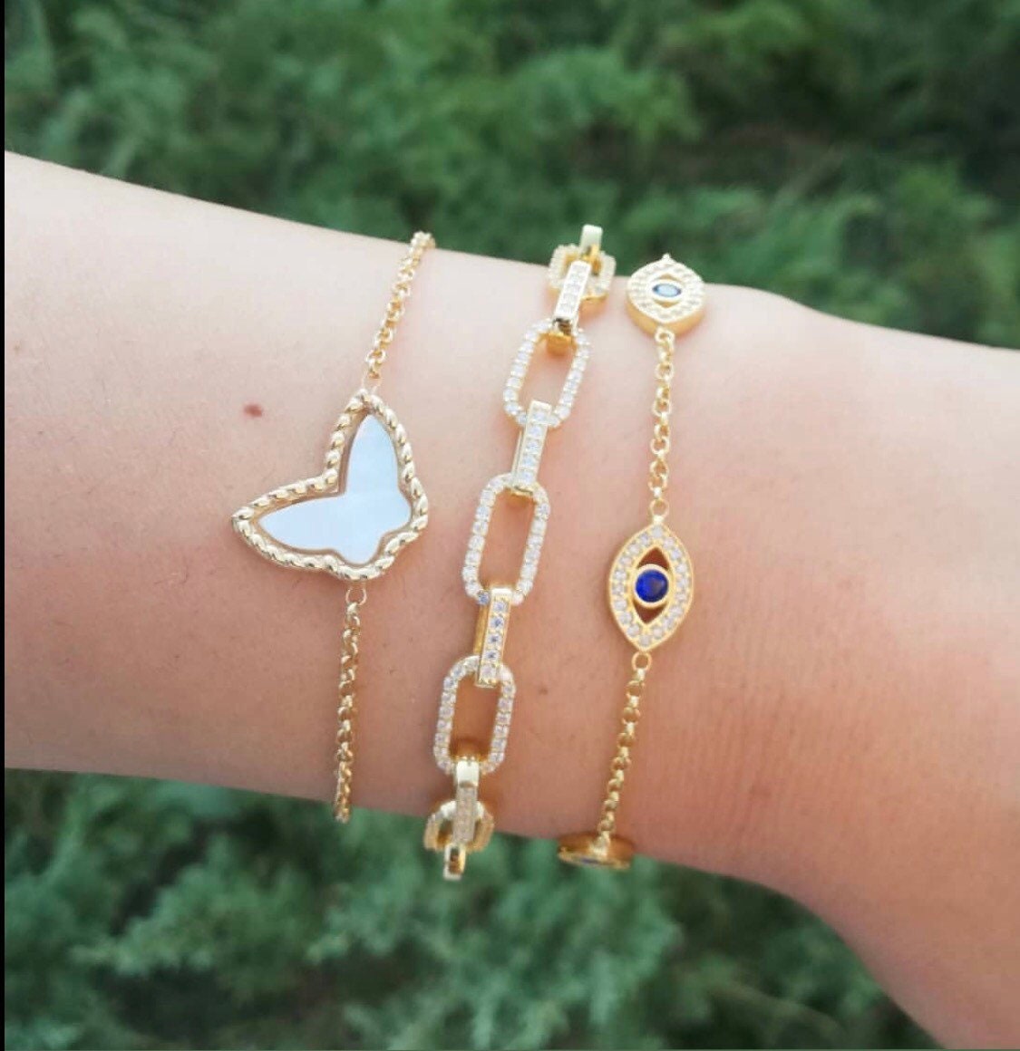 Multi-eye evil eye bracelets in sterling silver gold, rose gold and silver. Khamsa bracelets