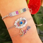 evil eye bracelets in sterling silver colors gold, rose gold and silver. Evil eye rainbow bracelet. Khamsa bracelets.