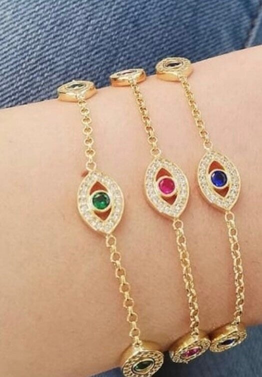 Multi-eye evil eye bracelets in sterling silver gold, rose gold and silver. Khamsa bracelets