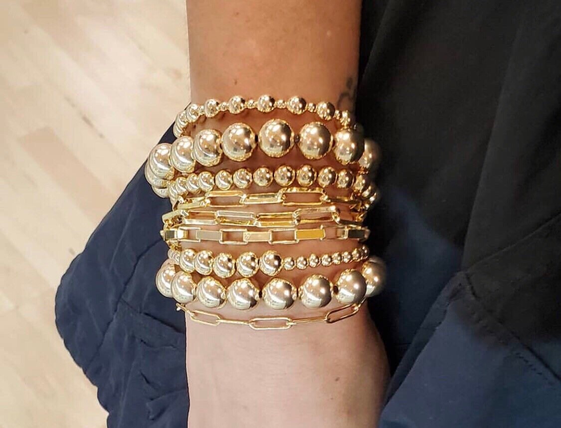 14k Gold filled bead ball bracelets in rose gold and yellow gold. Make the perfect stack! Wont tarnish! Gold filled Ball bracelets.