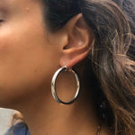 18K Gold-filled hollow hoop earrings in gold and silver. 2” diameter. Super light weight and hollow. Gold filled hoops. Gold filled earrings