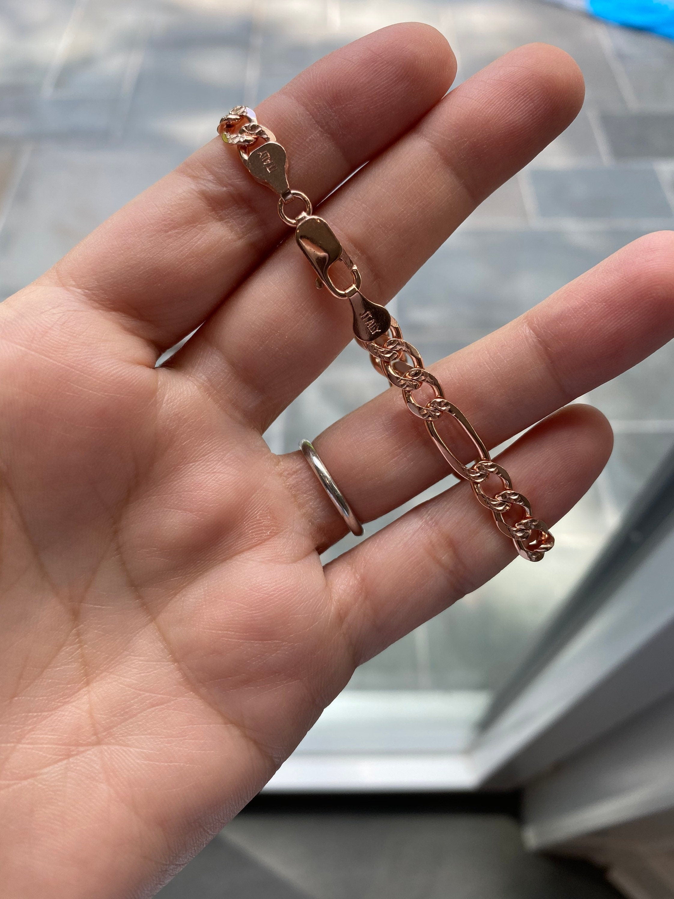 Figaro chain link bracelet in rose gold, gold and silver. Sterling silver and gold plated.