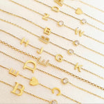 Sterling silver and gold plated CZ initial bracelets. Letter bracelets. Personalized bracelets. Mommy bracelet with heart.