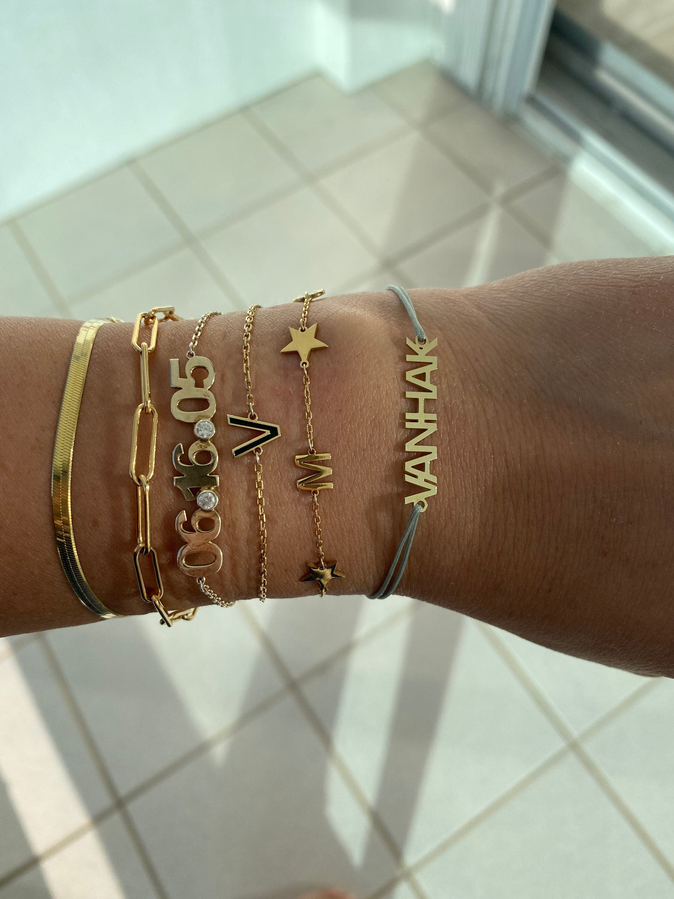 Nameplate string bracelet. Name bracelet. Personalized string bracelets. Custom string bracelets.