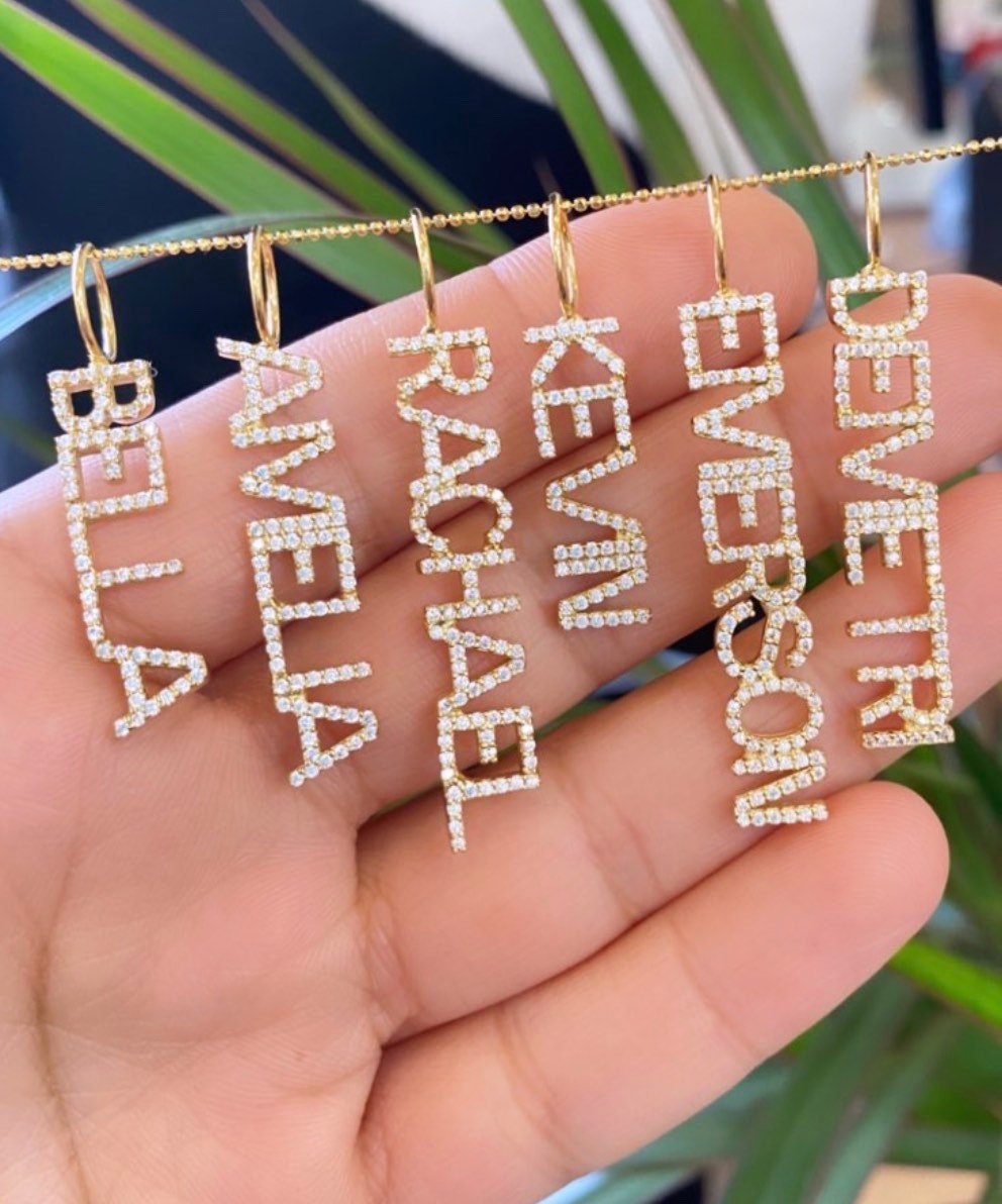 As seen on Kyle Richards, Kathy Hilton and Teddi Mellencamp. Personalized Pave Name Charms. Diamond Charms. CZ charms. Custom name charms.