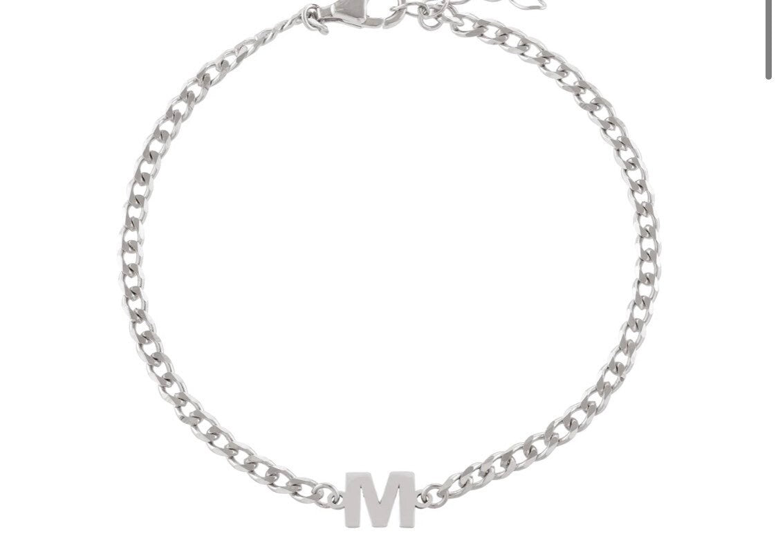 Custom initial bracelet on a cuban link chain. Personalized initialbracelet on a curb chain. Sterling silver gold plated initial bracelet.
