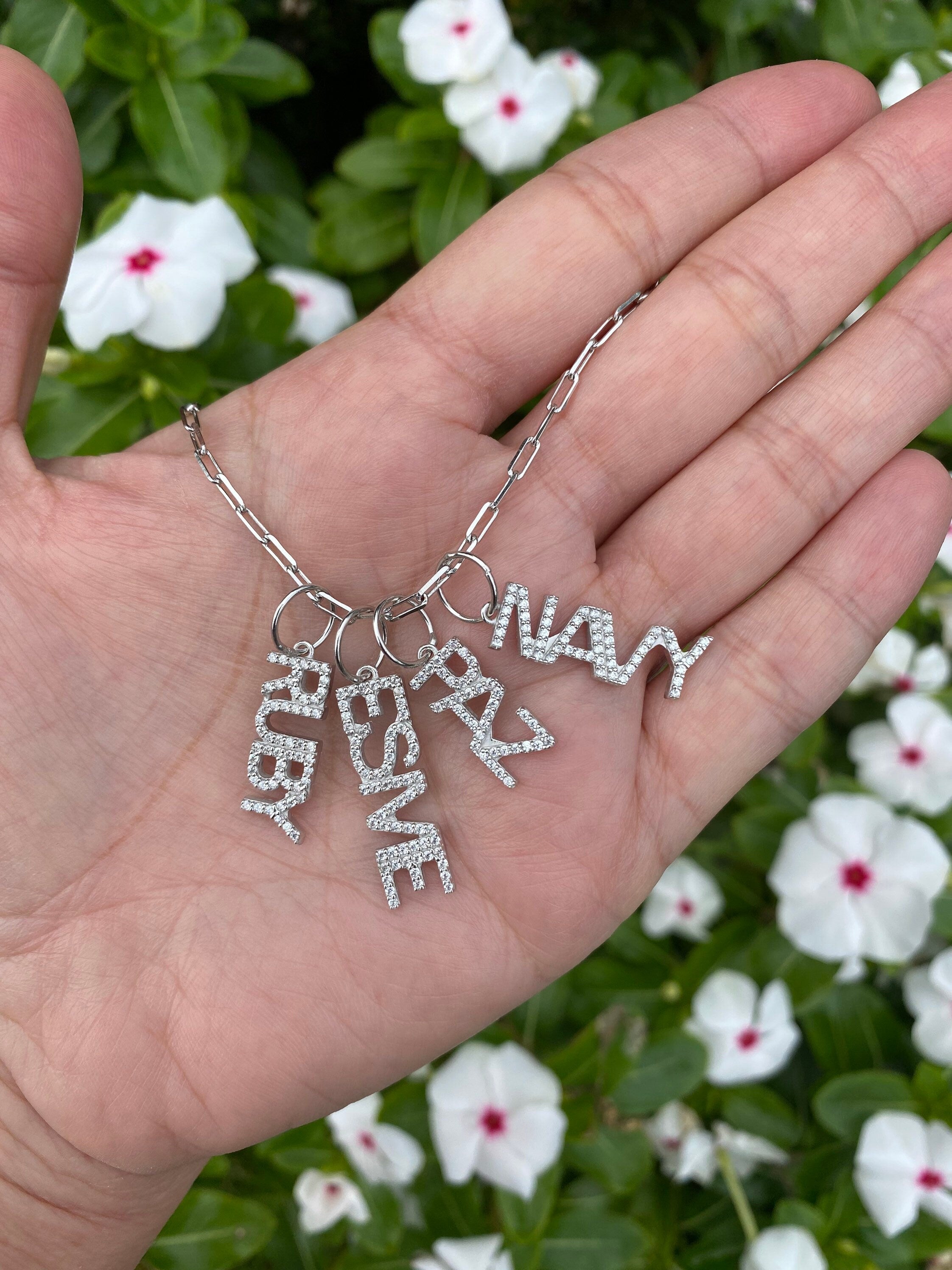 As seen on Carrie Nachmani. Personalized Pave Name Charms. Diamond Charms. CZ charms. Custom name charms.