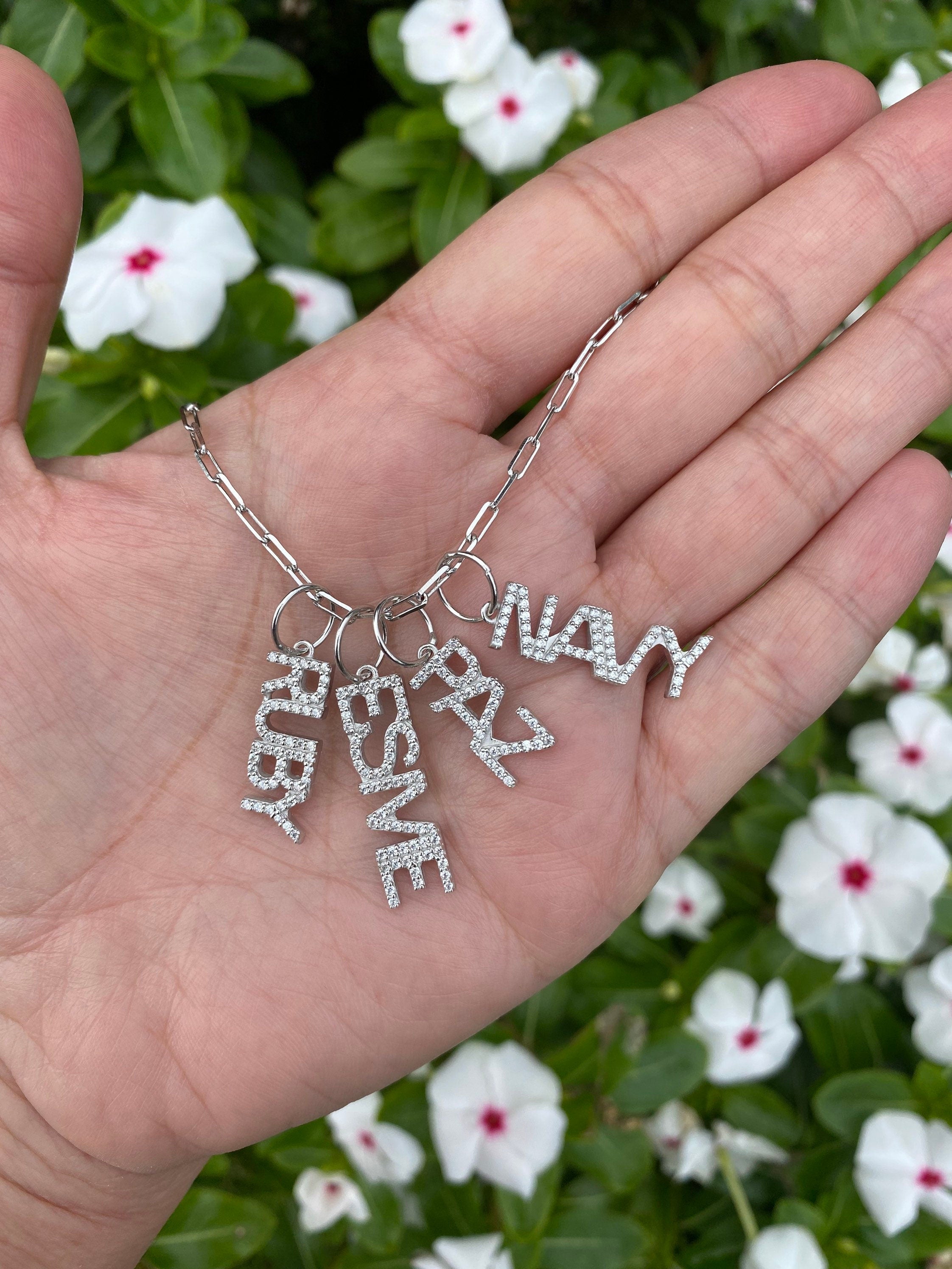As seen on Caroline Baudino. Personalized Pave Name Charms. Diamond Charms. CZ charms. Custom name charms on Shop with Caroline.