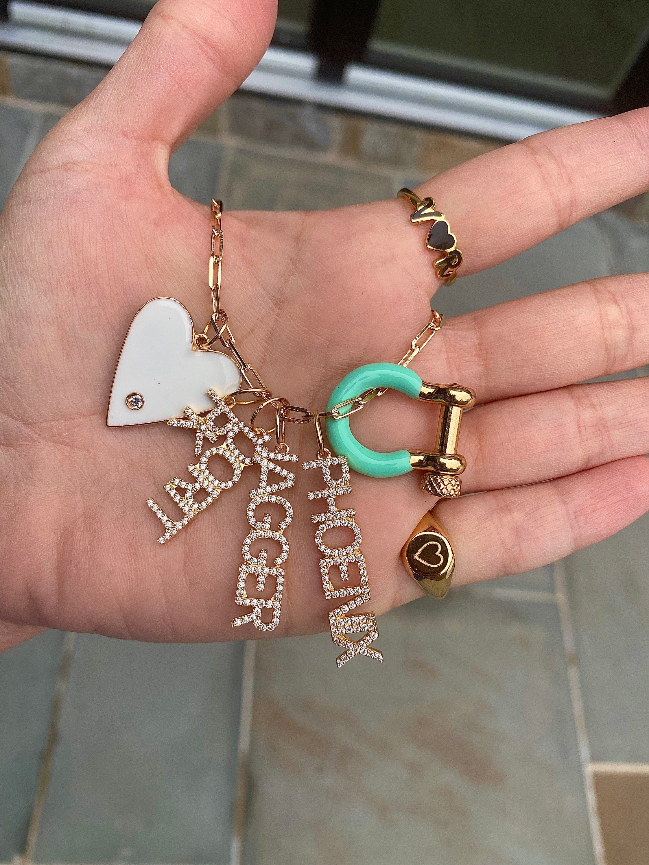 As seen on the Real Housewives of Beverly Hills Dorit Kemsley. Personalized Pave Name Charms. Diamond Charms. CZ charms. Custom name charms.