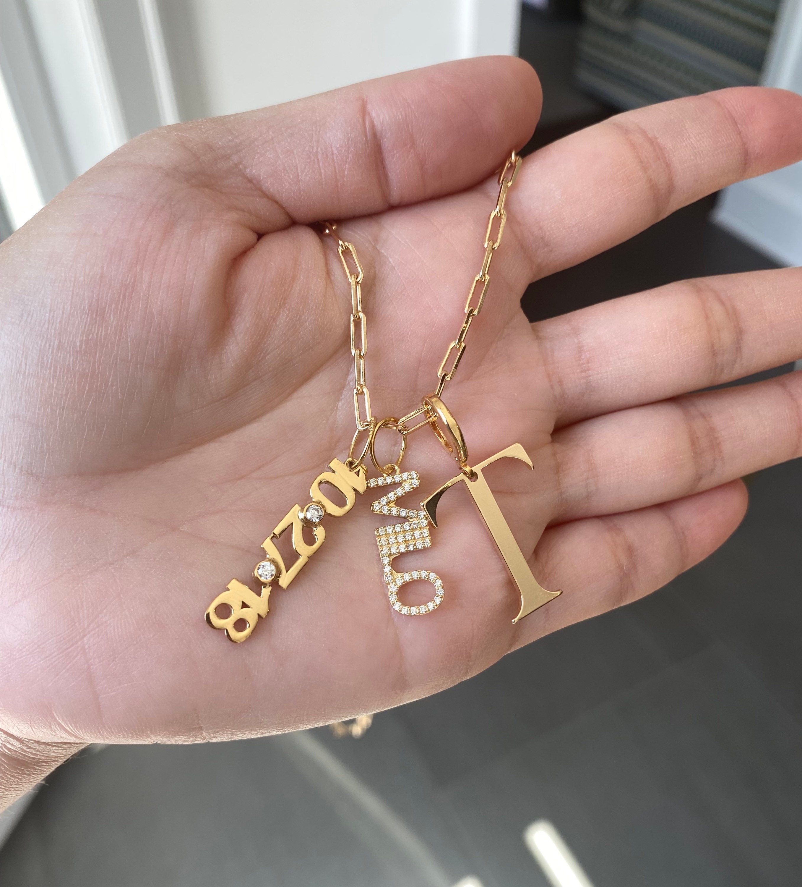 As seen on Tara Moni. Personalized Pave Name Charms. Diamond Charms. Custom name charms. Jumbo Initial charm. Date charm. Anniversary charm
