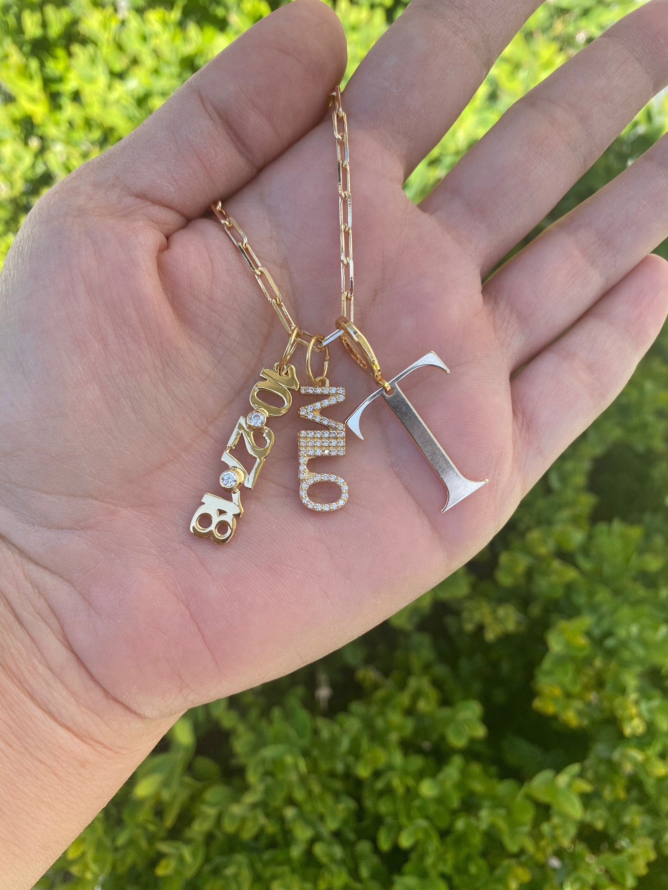 As seen on Tara Moni. Personalized Pave Name Charms. Diamond Charms. Custom name charms. Jumbo Initial charm. Date charm. Anniversary charm