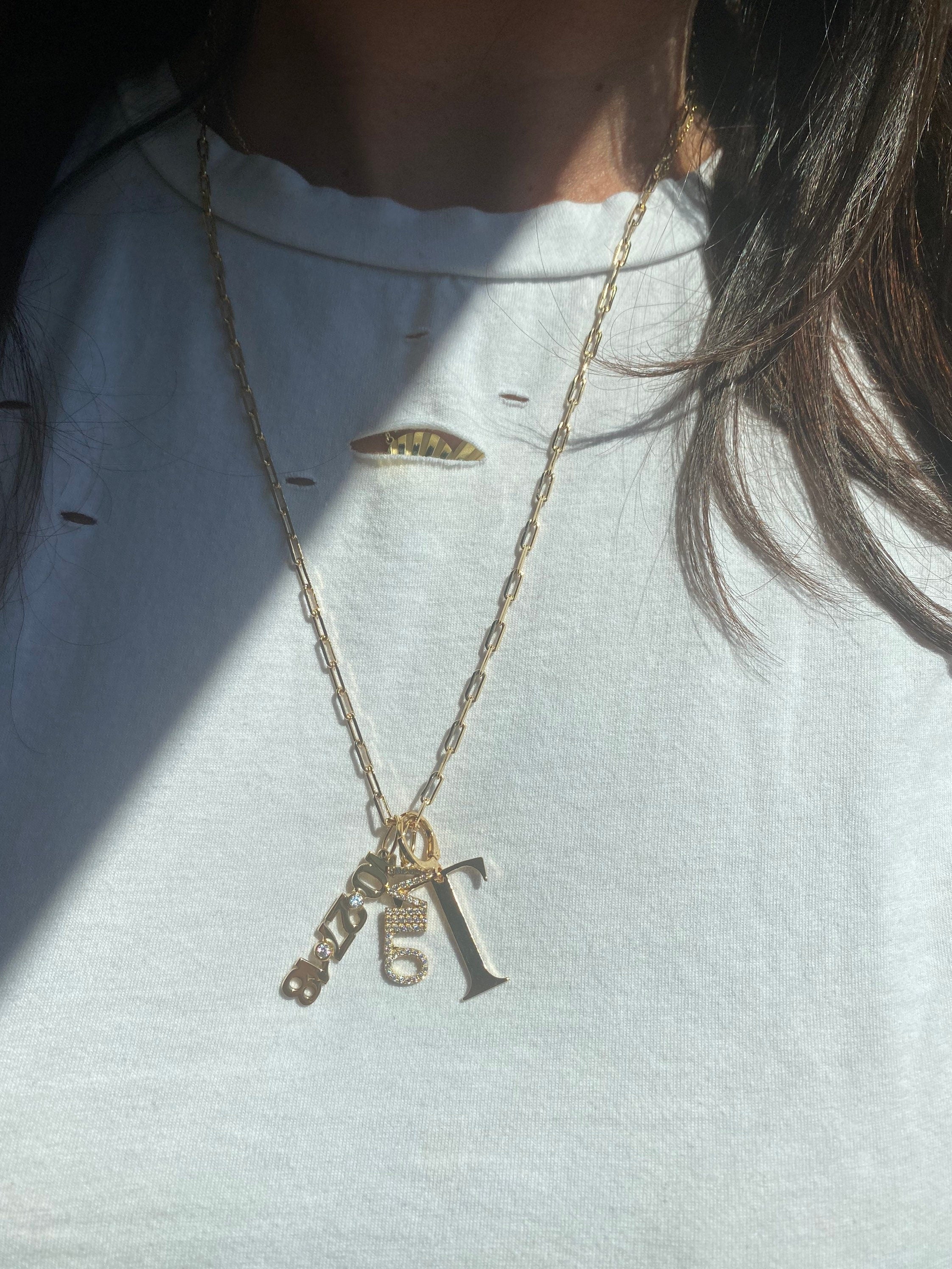 As seen on Teggy French. Personalized Pave Name Charms. Diamond Charms. Custom name charms. Jumbo Initial charm Date charm Anniversary charm