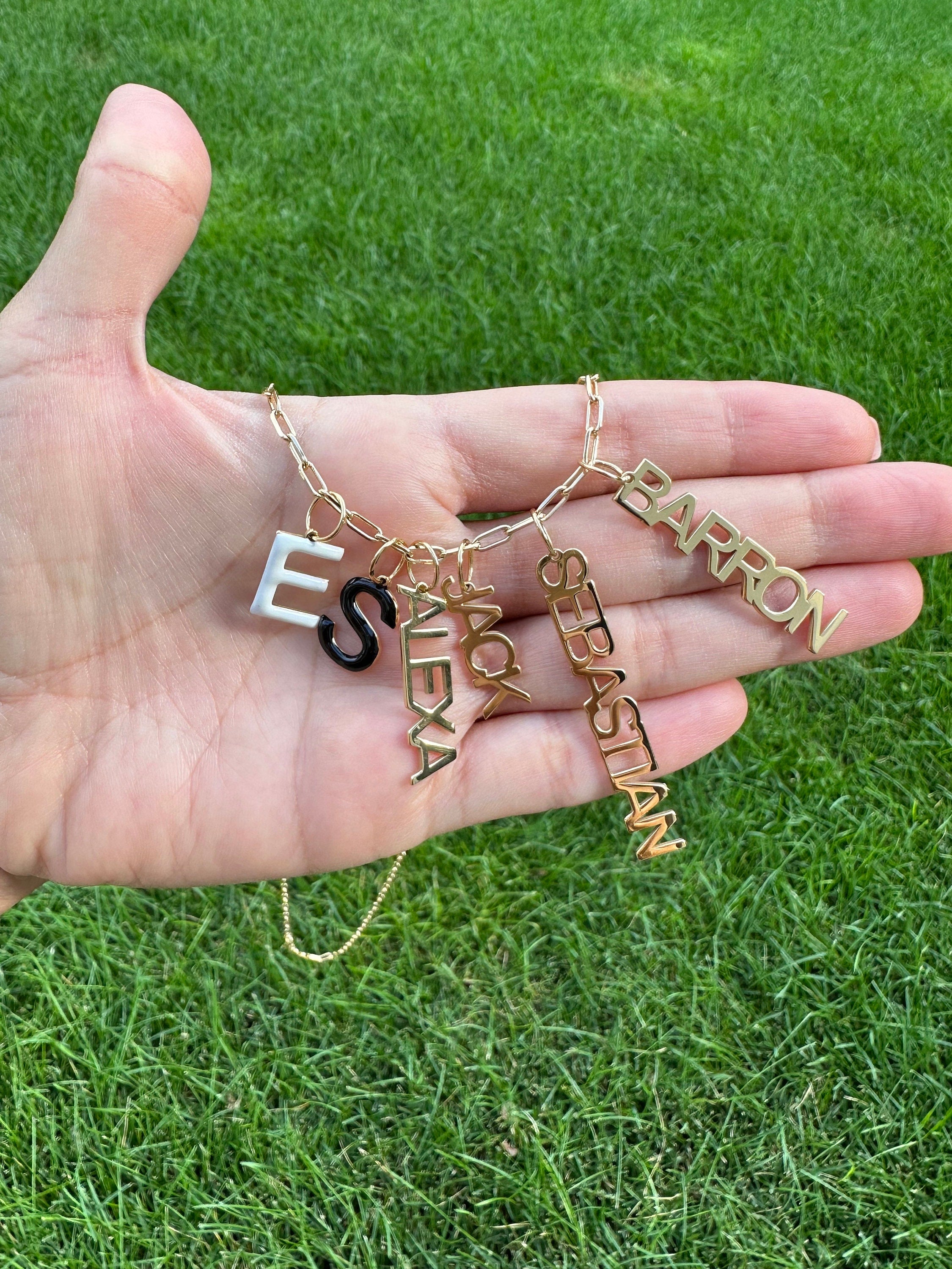 As seen on Esther and Sasha! Personalized Name Charms. Custom Charms. Enamel initial charms. Custom name charms.