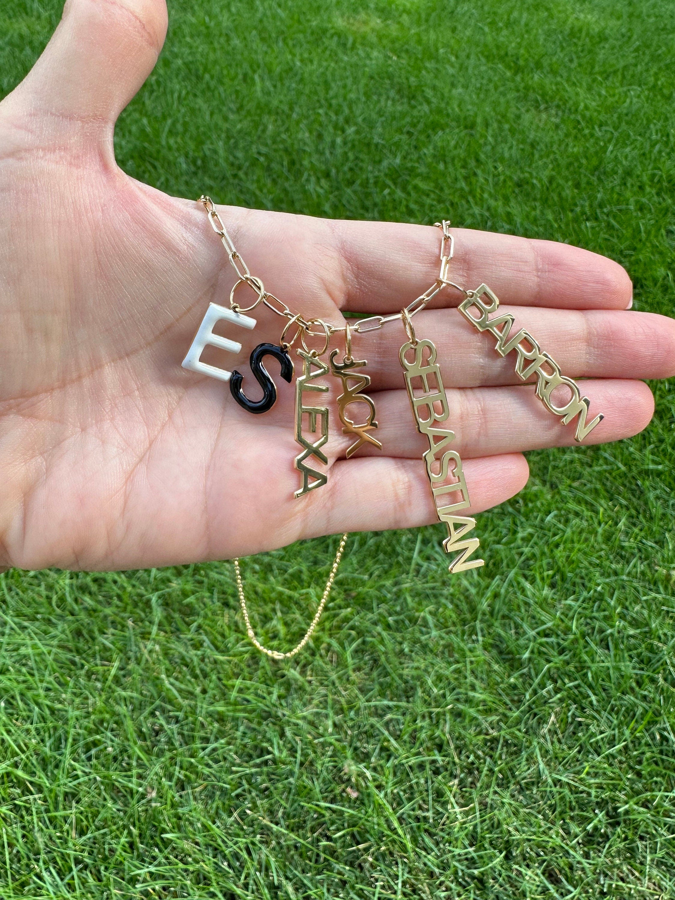 As seen on Esther and Sasha! Personalized Name Charms. Custom Charms. Enamel initial charms. Custom name charms.