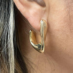 18K Gold-filled hollow hoop earrings in gold and silver. Super light weight and hollow. Gold filled hoops. Gold filled earrings.