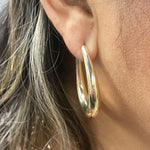 18K Gold-filled hollow hoop earrings in gold and silver. Super light weight and hollow. Gold filled hoops. Gold filled earrings.