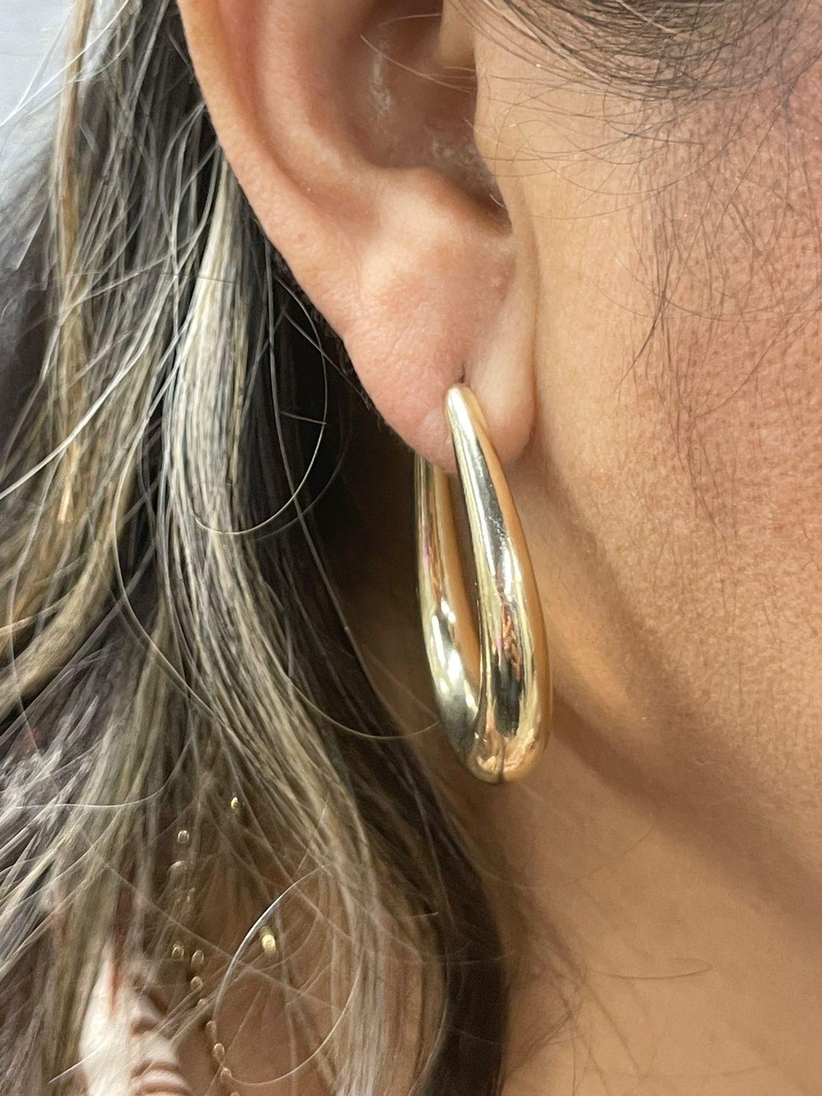 18K Gold-filled hollow hoop earrings in gold and silver. Super light weight and hollow. Gold filled hoops. Gold filled earrings.