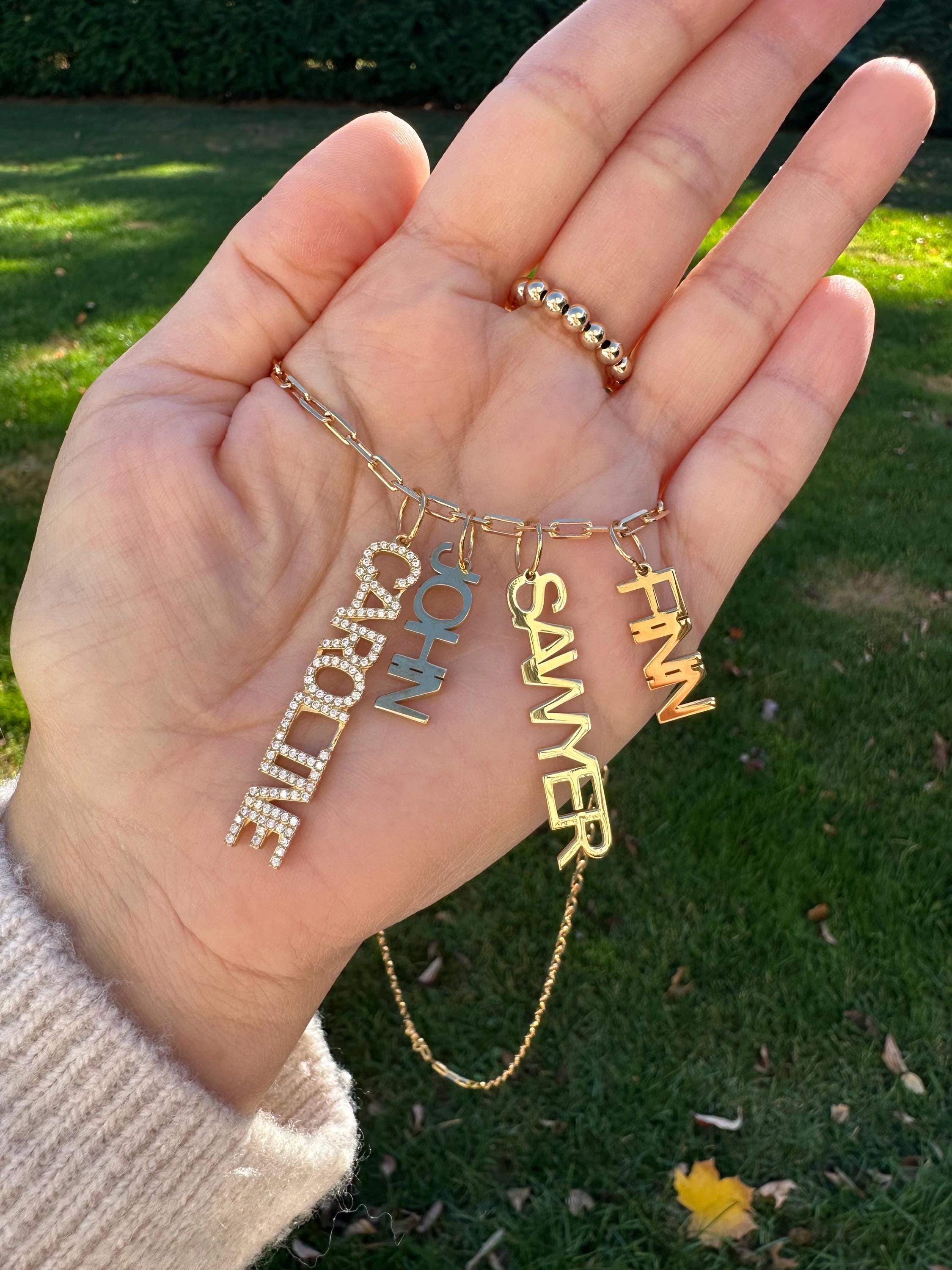 As seen on Caroline Baudino. Personalized Pave Name Charms. Diamond Charms. CZ charms. Custom name charms on Shop with Caroline.
