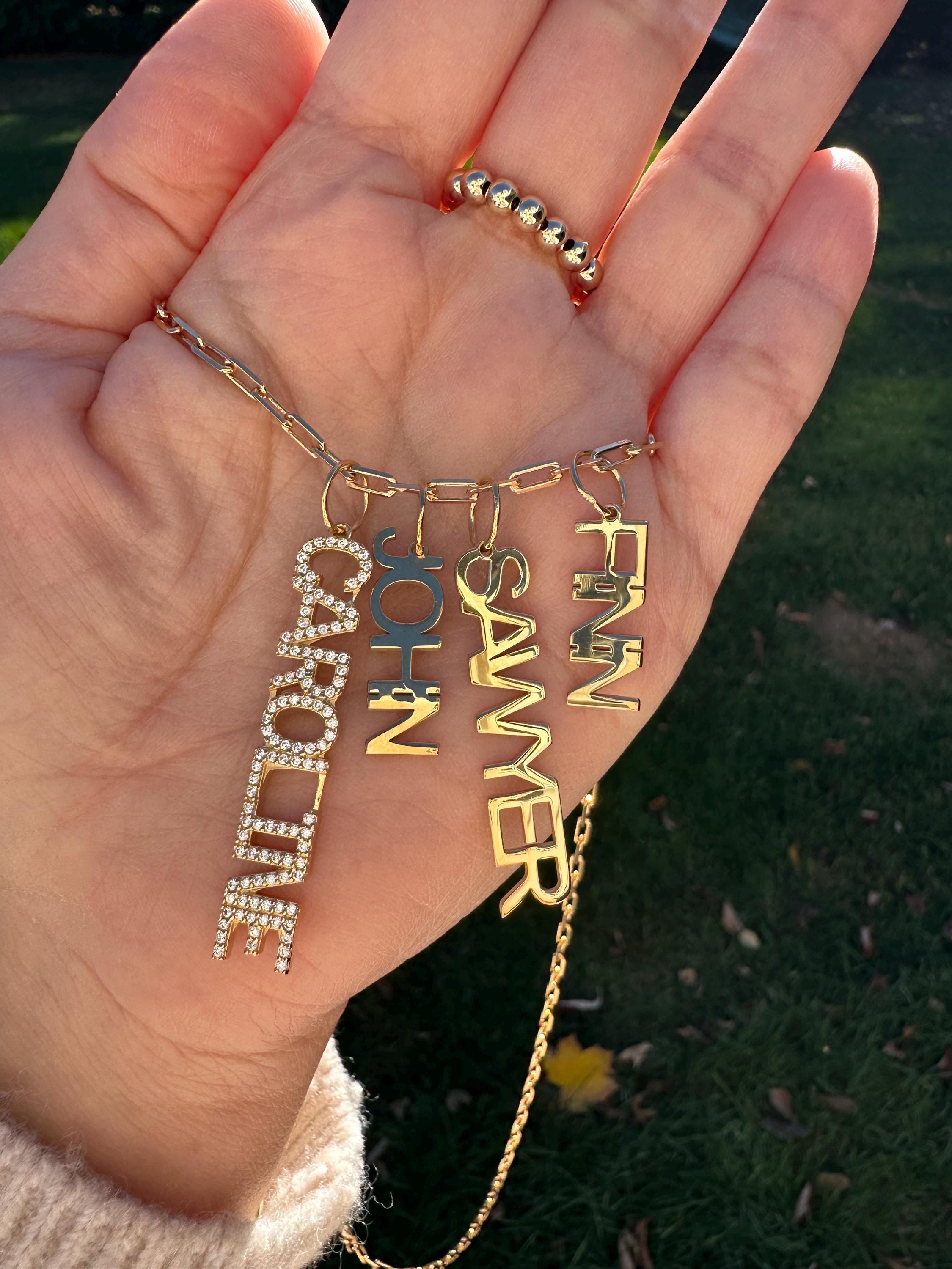 As seen on Caroline Baudino. Personalized Pave Name Charms. Diamond Charms. CZ charms. Custom name charms on Shop with Caroline.