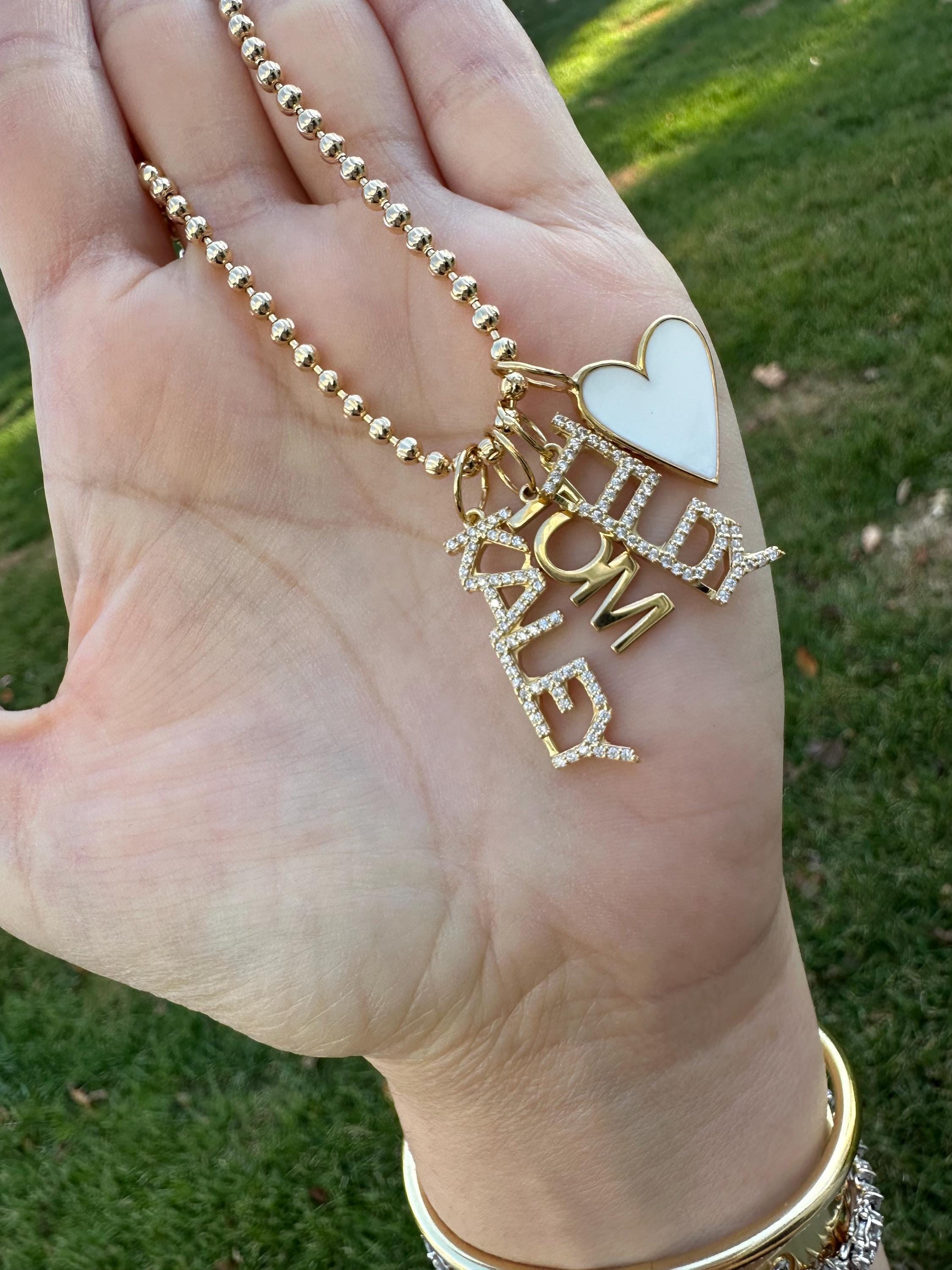 As seen on Caroline Baudino. Personalized Pave Name Charms. Diamond Charms. CZ charms. Custom name charms on Shop with Caroline.