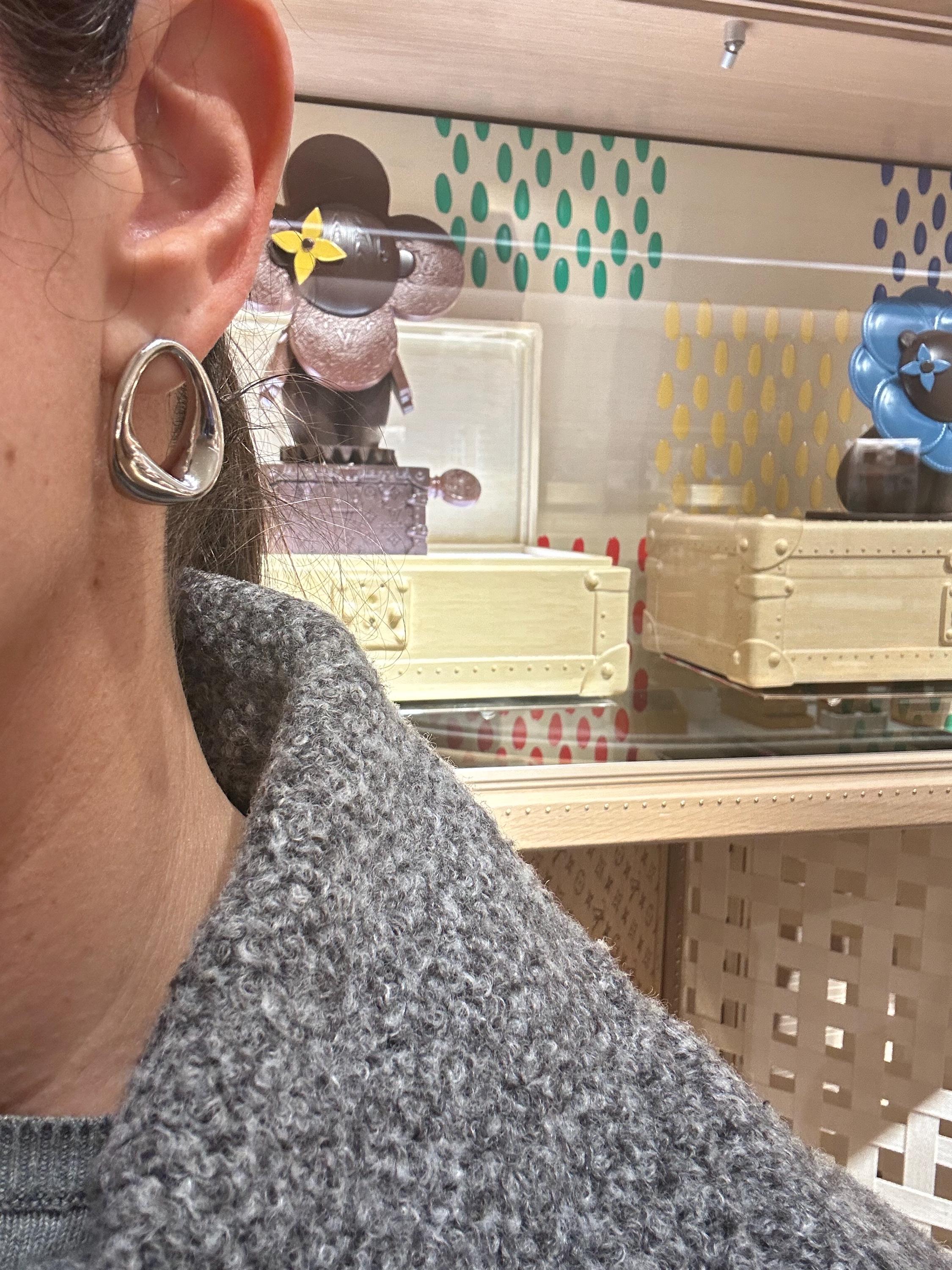 18K Gold-filled hollow hoop loop earrings in gold and silver. Super light weight and hollow. Gold filled hoops. Gold filled earrings.