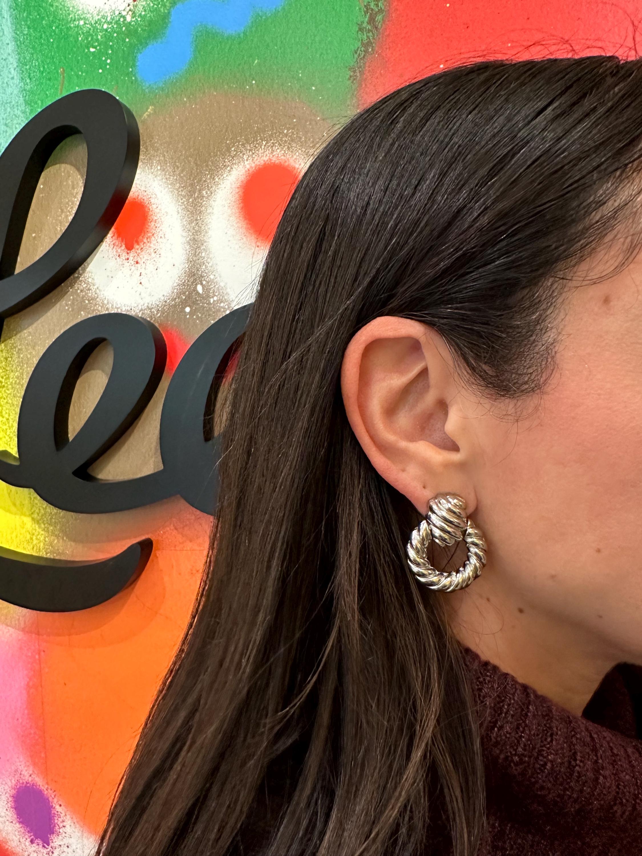 18K Gold filled hollow twisted hoop drop earrings in gold and silver. 18K Gold filled statement earrings. 18K Gold filled trendy earrings.