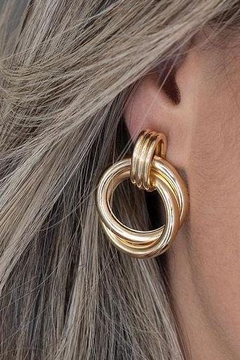 18K Gold-filled hollow twisted round drop earrings in gold and silver. Super light weight and hollow. Gold filled trendy earrings.