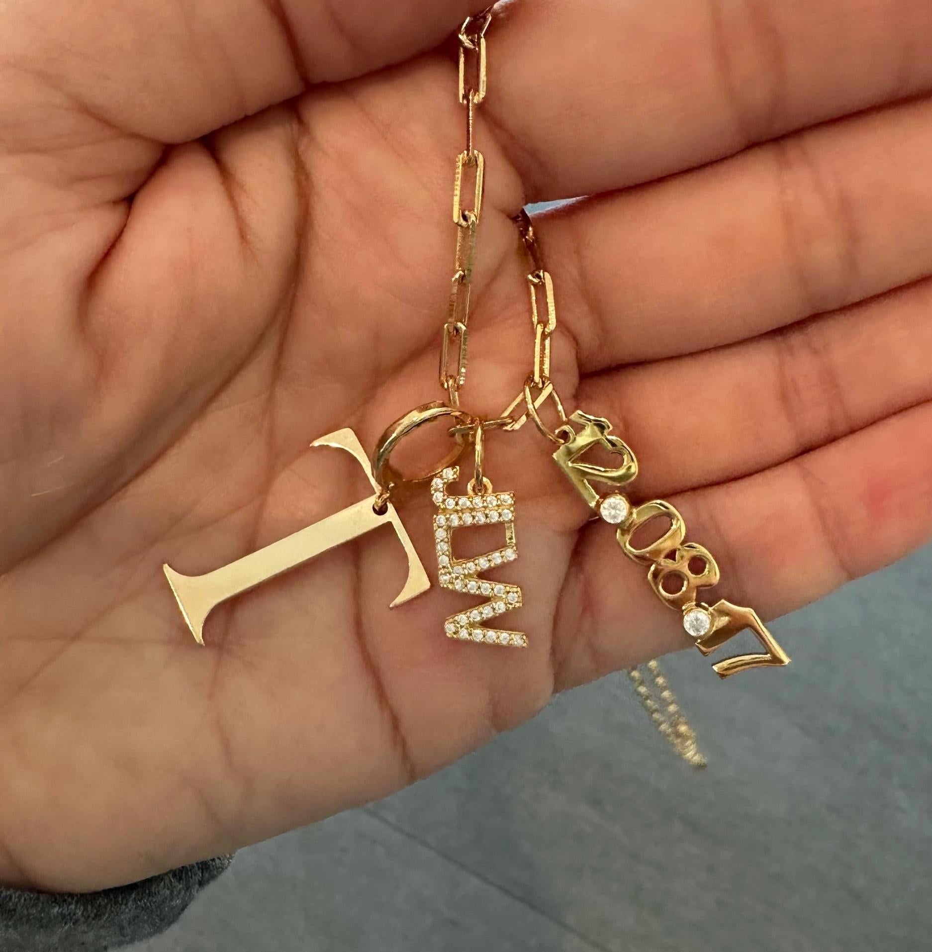 As seen on Teggy French. Personalized Pave Name Charms. Diamond Charms. Custom name charms. Jumbo Initial charm Date charm Anniversary charm