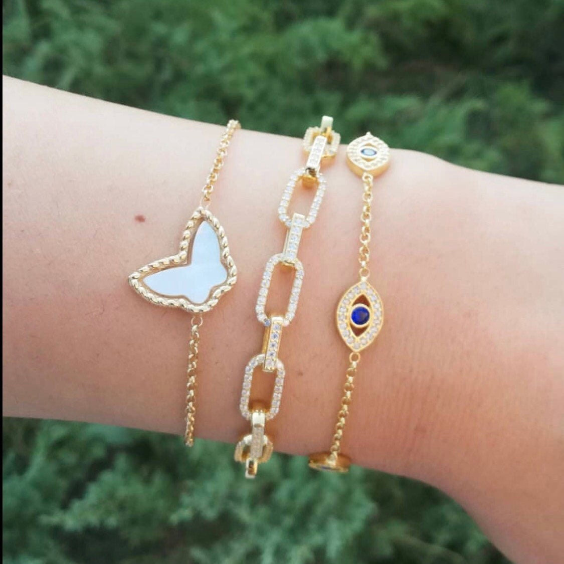 Multi-eye evil eye bracelets in sterling silver gold, rose gold and silver. Khamsa bracelets