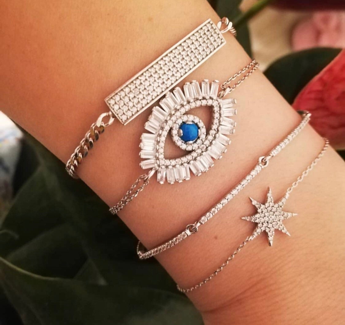 evil eye bracelets in sterling silver colors gold, rose gold and silver. Evil eye rainbow bracelet. Khamsa bracelets.