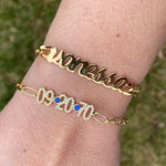 Custom name bracelet on a cuban link chain. Personalized script name bracelet. Sterling silver gold plated nameplate bracelet.