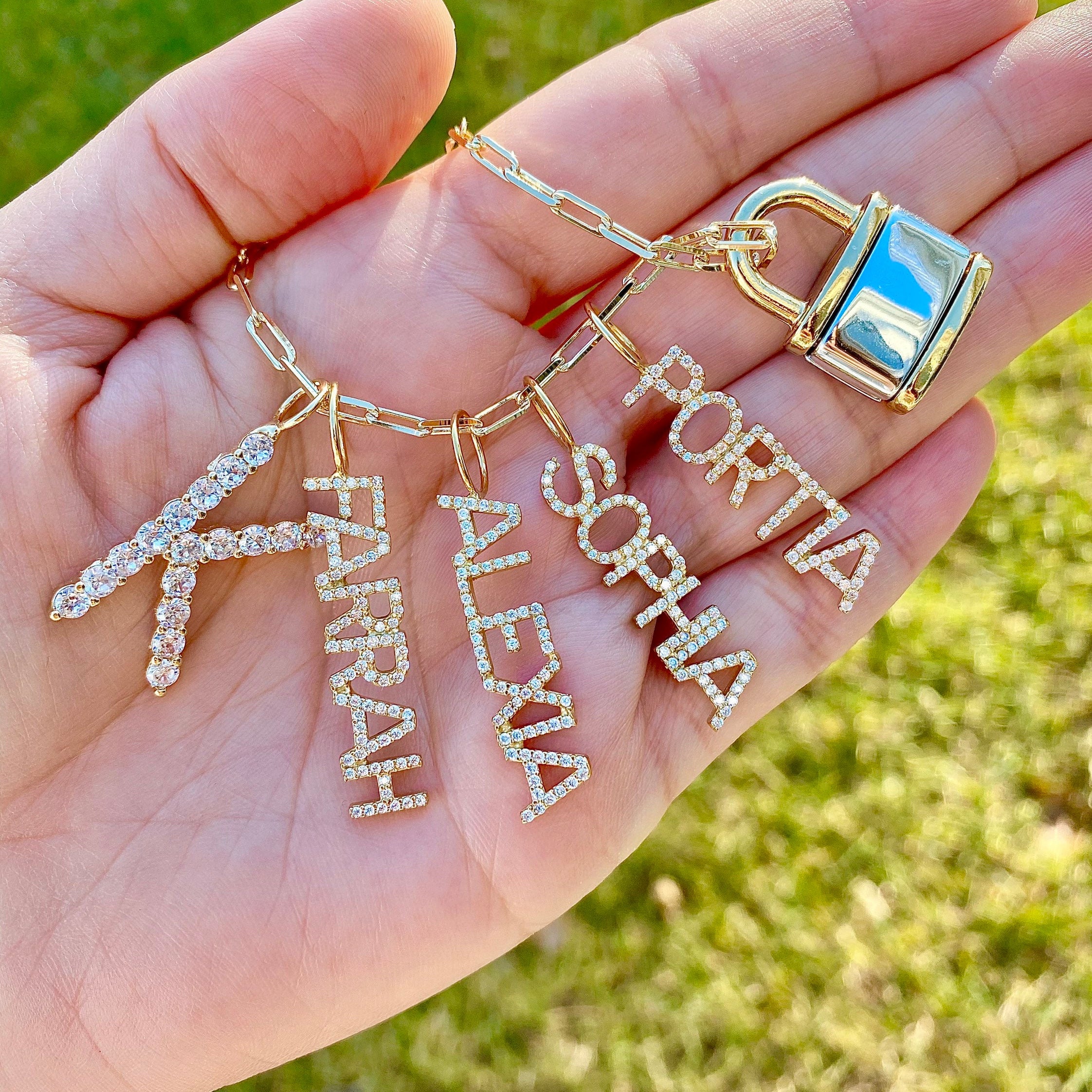 As seen on Kyle Richards, Kathy Hilton and Teddi Mellencamp. Personalized Pave Name Charms. Diamond Charms. CZ charms. Custom name charms.