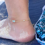 Butterfly anklet that’s sterling silver and gold plated.