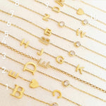 Sterling silver and gold plated CZ initial bracelets. Letter bracelets. Personalized bracelets. Mommy bracelet with heart.