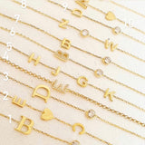 Sterling silver and gold plated CZ initial bracelets. Letter bracelets. Personalized bracelets. Mommy bracelet with heart.