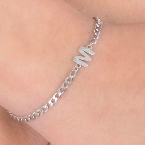 Custom initial bracelet on a cuban link chain. Personalized initialbracelet on a curb chain. Sterling silver gold plated initial bracelet.