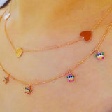 Rainbow dangling stars necklace. Rainbow dangling star choker. Multi-color star necklace. Gold, rose gold and silver.