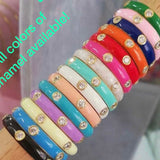 Sterling silver and gold plated enamel butterfly bracelets. Butterfly jewelry. Colorful butterfly bracelets.