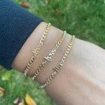 Custom name bracelet on a cuban link chain. Personalized name bracelet on a curb chain. Sterling silver gold plated nameplate bracelet.