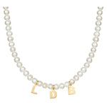 Mommy necklace with pearls and initials. Sterling silver and 14K gold plated. Available in gold or silver.