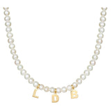 Mommy necklace with pearls and initials. Sterling silver and 14K gold plated. Available in gold or silver.