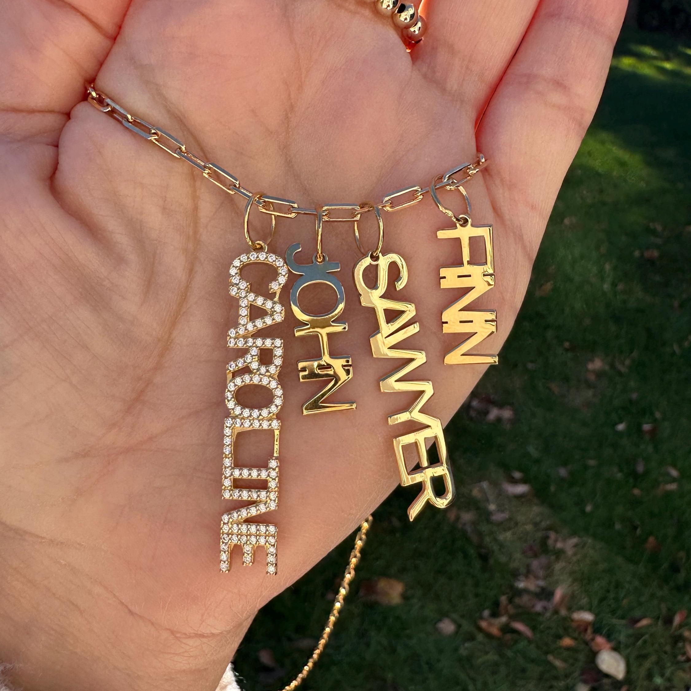 As seen on Caroline Baudino. Personalized Pave Name Charms. Diamond Charms. CZ charms. Custom name charms on Shop with Caroline.