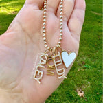 As seen on Caroline Baudino. Personalized Pave Name Charms. Diamond Charms. CZ charms. Custom name charms on Shop with Caroline.