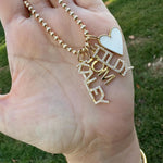 As seen on Caroline Baudino. Personalized Pave Name Charms. Diamond Charms. CZ charms. Custom name charms on Shop with Caroline.