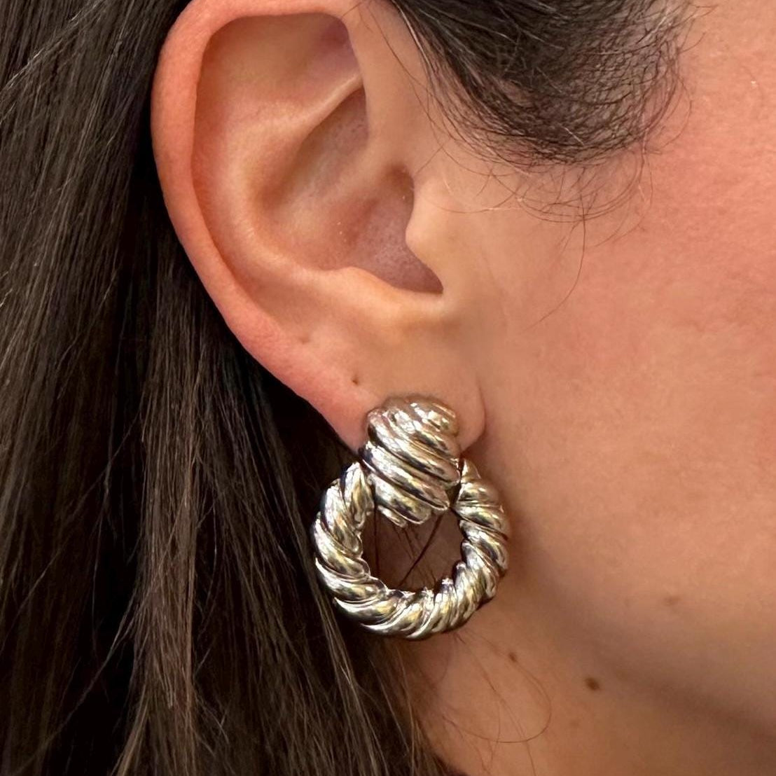18K Gold filled hollow twisted hoop drop earrings in gold and silver. 18K Gold filled statement earrings. 18K Gold filled trendy earrings.