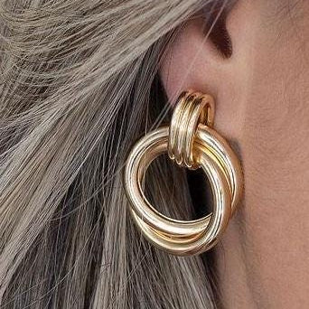 18K Gold-filled hollow twisted round drop earrings in gold and silver. Super light weight and hollow. Gold filled trendy earrings.