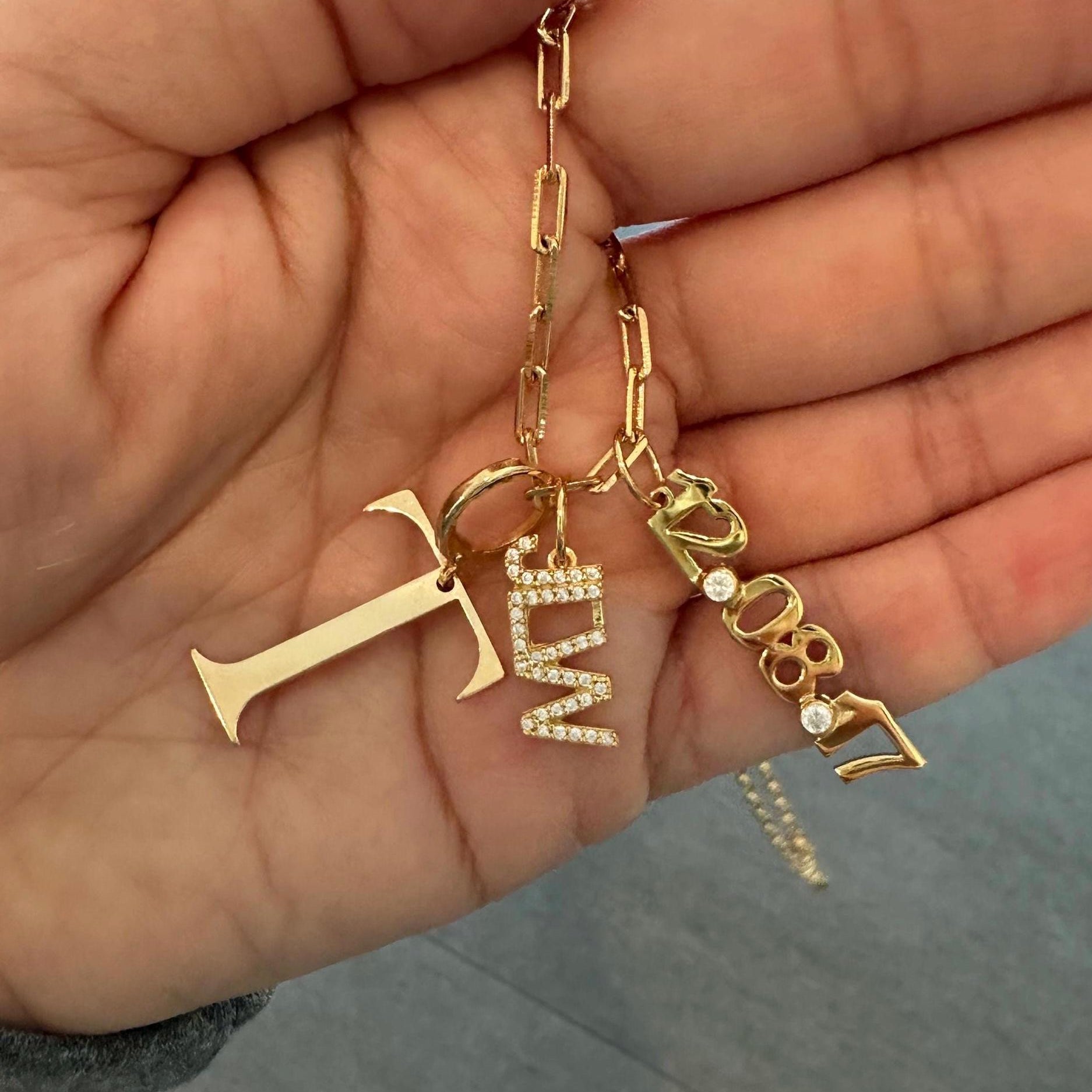 As seen on Teggy French. Personalized Pave Name Charms. Diamond Charms. Custom name charms. Jumbo Initial charm Date charm Anniversary charm