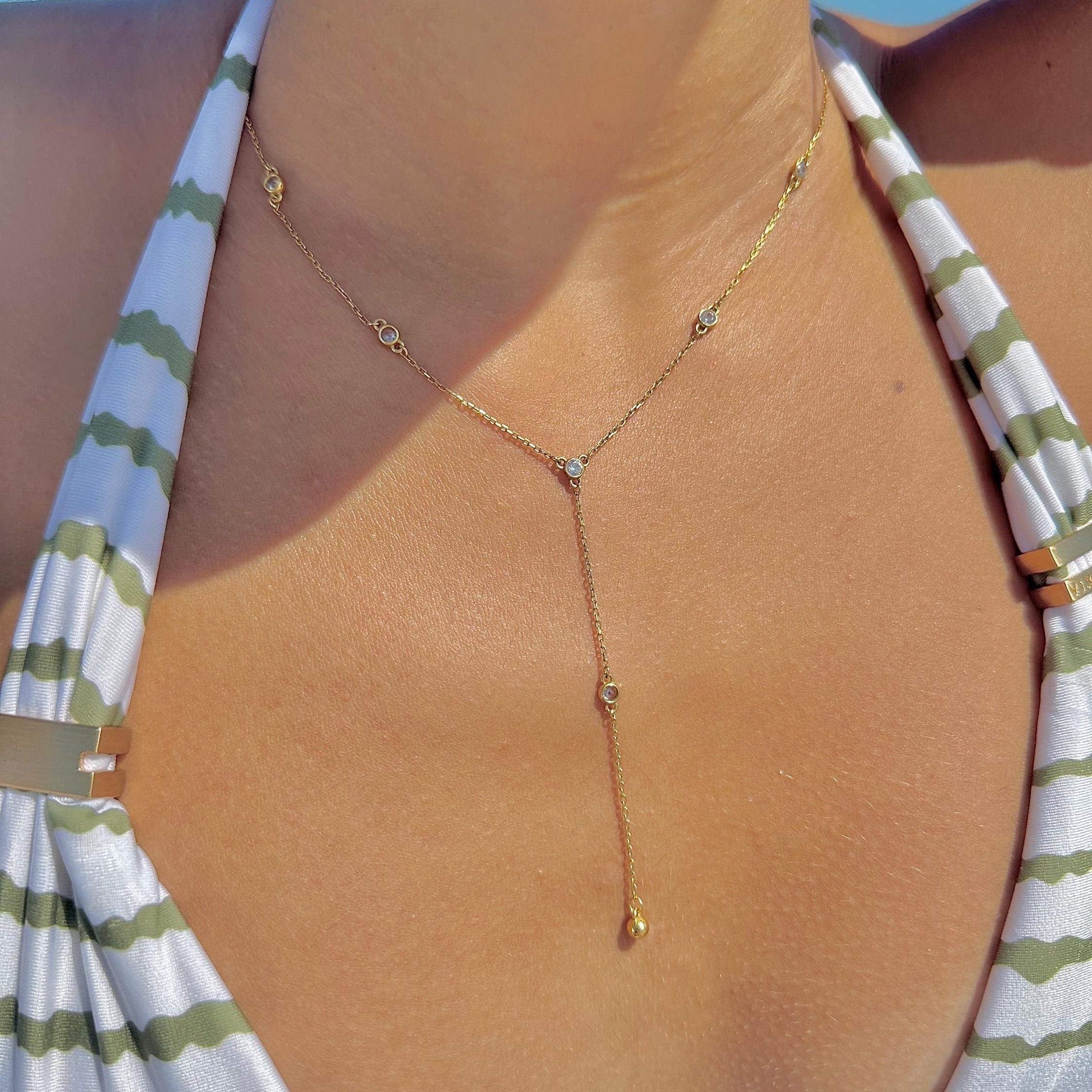 Mimi diamond bezel lariat necklace. Diamond by the yard lariat necklace. Diamond lariat necklace. Sterling silver gold plated.