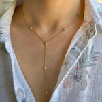 Mimi diamond bezel lariat necklace. Diamond by the yard lariat necklace. Diamond lariat necklace. Sterling silver gold plated.