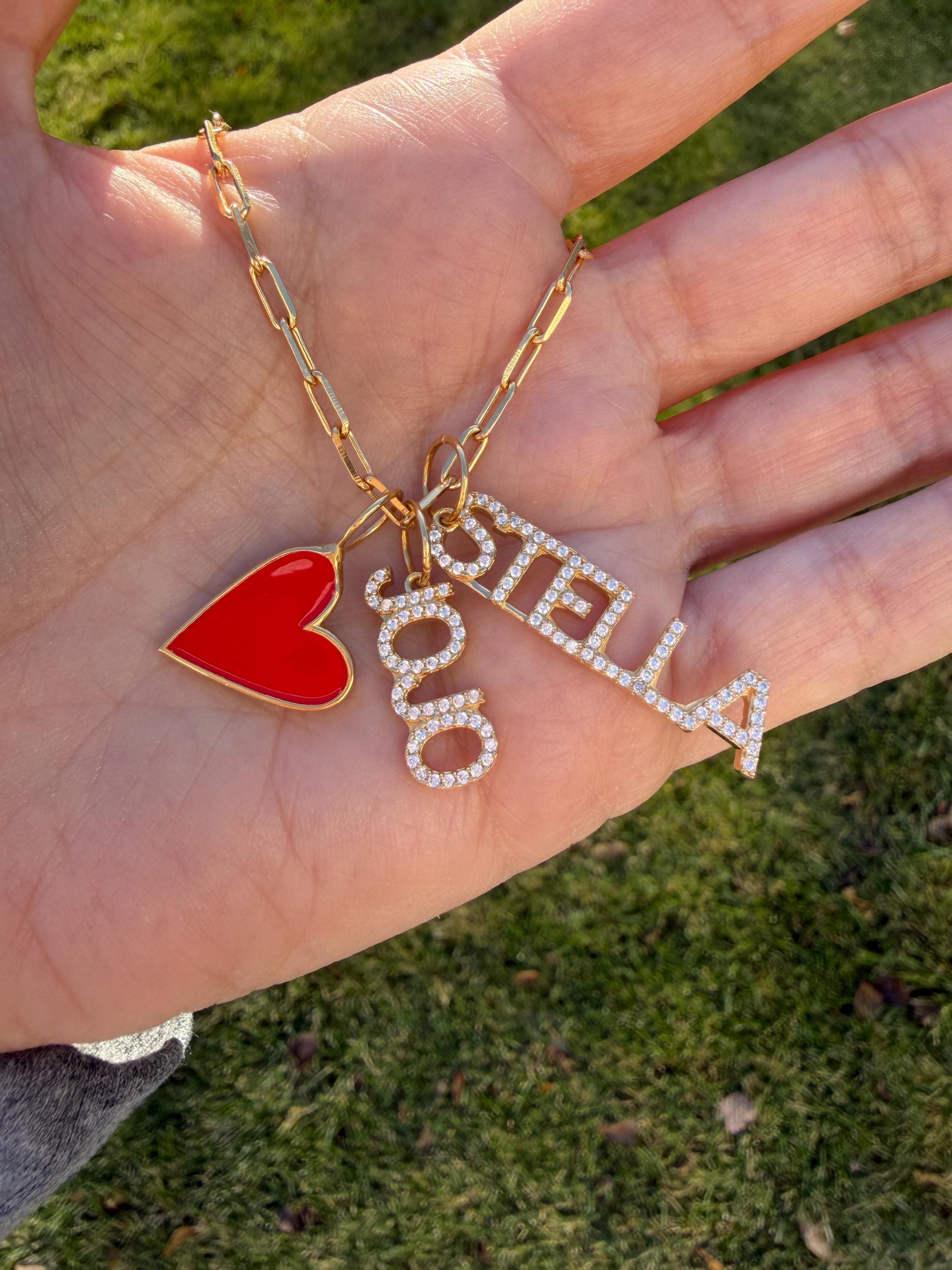 As seen on Stephanie Olivia. Personalized Pave Name Charms. Diamond Charms. CZ charms. Custom name charms. Enamel heart charm.